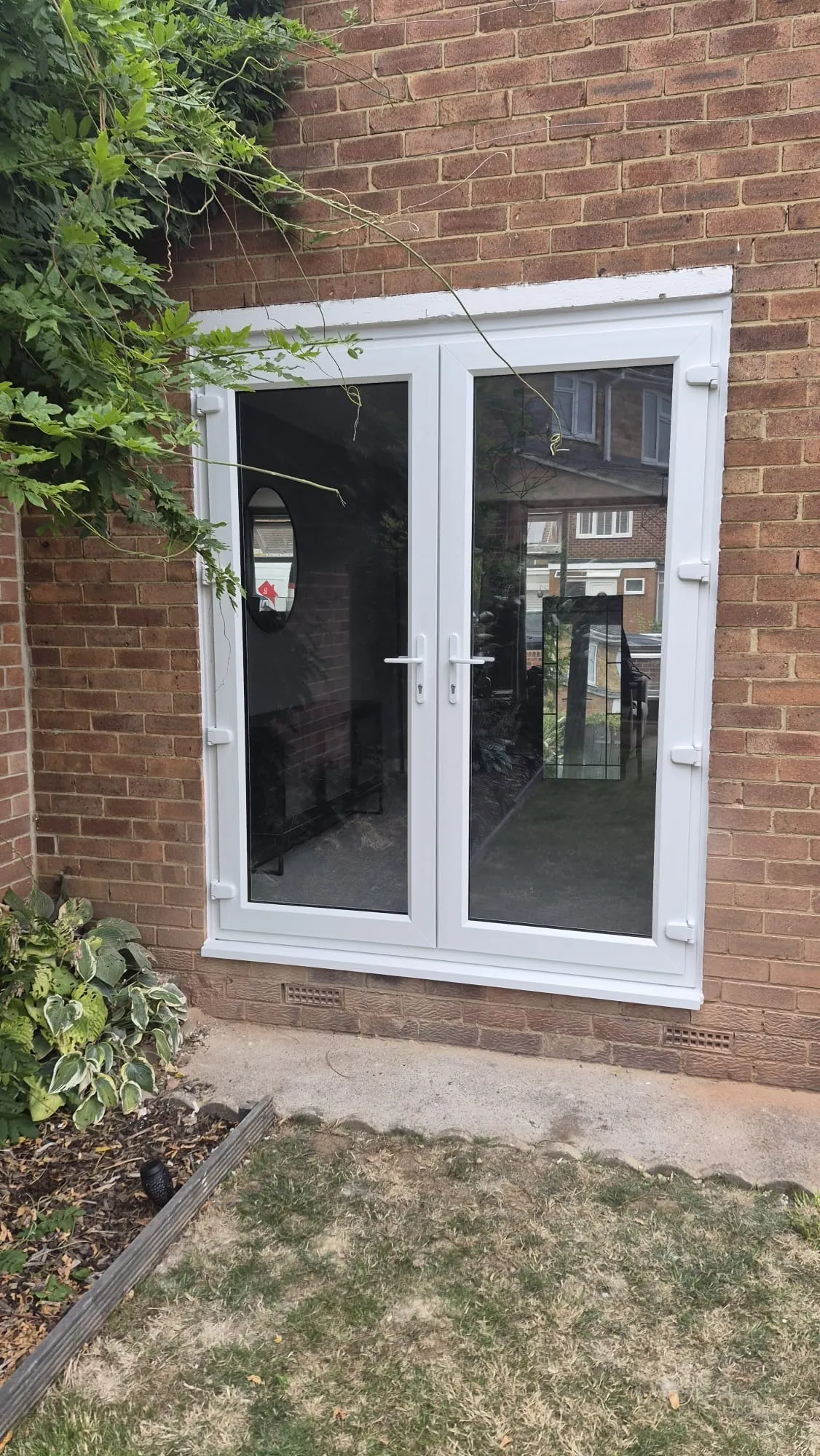 White uPVC French doors fitted by DW Glazing in Hartlepool and Teesside